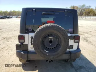 2015 Jeep Wrangler Unlimited Sport RHD with VIN 1C4BJWKG0FL690763, listed as a Copart auction lot 48823714 with 156,714 mi miles and Salvage title. Bid and sale history available at DreamBid. Image 6.