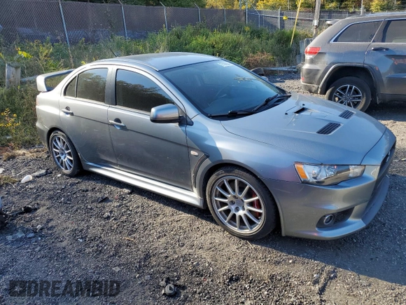 2014 Mitsubishi Lancer Evolution GSR z VIN JA32W8FV6EU018171, wystawiony jako Copart lot #77109934 z przebiegiem 83 467 mil mil oraz Tytuł czysty. Historia ofert i sprzedaży dostępna na DreamBid. Obrazek 4.