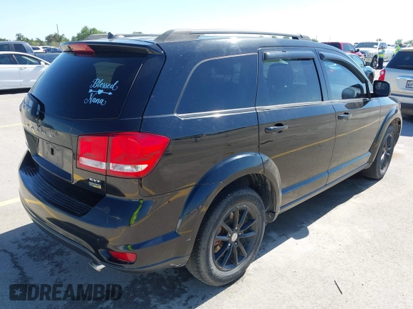 2015 Dodge Journey SXT with VIN 3C4PDCBG0FT595359, listed as a IAAI auction lot 41987773 with 135,528 mi miles. Bid and sale history available at carsss.com. Image 4.