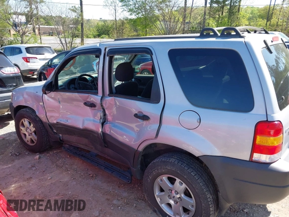 2003 Ford Escape XLT Popular 2 with VIN 1FMYU93183KD62338, listed as a IAAI auction lot 41990799 with 216,952 mi miles and . Bid and sale history available at DreamBid. Image 14.