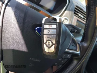 2017 Ford Fusion Titanium with VIN 3FA6P0K90HR168031, listed as a IAAI auction lot 42578926 with 210,268 mi miles and . Bid and sale history available at DreamBid. Image 11.