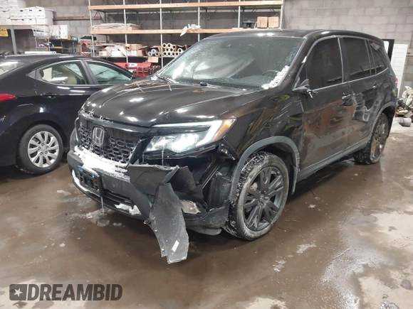 2020 Honda Passport EX-L with VIN 5FNYF8H53LB013931, listed as a IAAI auction lot 41614095 with 68,537 mi miles and . Bid and sale history available at DreamBid. Image 6.