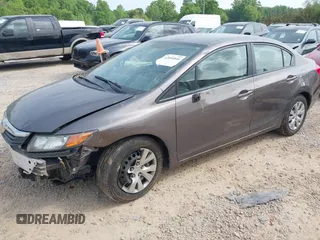 2012 Honda Civic LX with VIN 2HGFB2F57CH528266, listed as a IAAI auction lot 42094846 with 120,244 mi miles and . Bid and sale history available at DreamBid. Image 2.