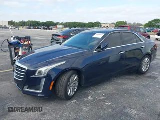 2016 Cadillac CTS RWD with VIN 1G6AP5SX8G0119984, listed as a IAAI auction lot 42098257 with 98,593 mi miles and . Bid and sale history available at DreamBid. Image 2.