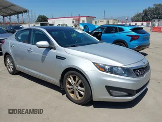 2013 Kia Optima EX z VIN 5XXGN4A72DG199317, wystawiony jako IAAI lot #42517407 z przebiegiem 160 402 mil mil oraz . Historia ofert i sprzedaży dostępna na DreamBid. Obrazek 1.