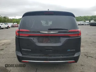 2023 Chrysler Pacifica Hybrid Limited с VIN 2C4RC1S71PR630575, выставлен на аукционе Copart как лот 55826955 с пробегом 45 381 миль миль и Списание • Salvage title. История ставок и продаж доступна на DreamBid. Изображение 6.