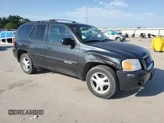 2004 GMC Envoy SLE z VIN 1GKDT13S842242030, wystawiony jako Copart lot #56712035 z przebiegiem 186 749 mil mil oraz Szkody całkowita. Historia ofert i sprzedaży dostępna na DreamBid. Obrazek 4.