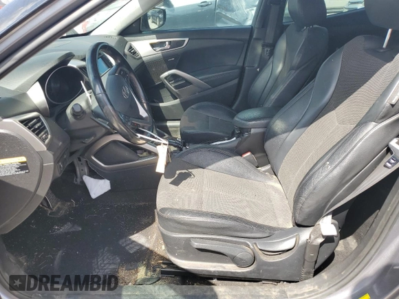 2014 Hyundai Veloster with VIN KMHTC6AD2EU216209, listed as a Copart auction lot 68901093 with 106,189 mi miles and Salvage title. Bid and sale history available at DreamBid. Image 7.