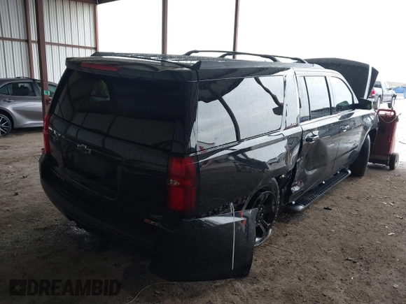 2020 Chevrolet Suburban LT z VIN 1GNSKHKC4LR304237, wystawiony jako IAAI lot #41179977 z przebiegiem 94 302 mil mil oraz . Historia ofert i sprzedaży dostępna na DreamBid. Obrazek 4.