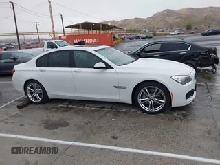 2013 BMW 7 Series 740i with VIN WBAYA6C57DC995338, listed as a IAAI auction lot 41479077 with 123,680 mi miles and . Bid and sale history available at DreamBid. Image 13.
