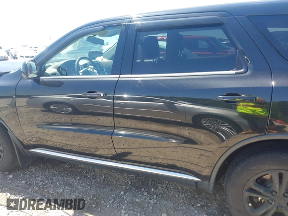 2013 Dodge Durango SXT with VIN 1C4RDJAG8DC617759, listed as a IAAI auction lot 42113300 with 185,152 mi miles and . Bid and sale history available at DreamBid. Image 14.