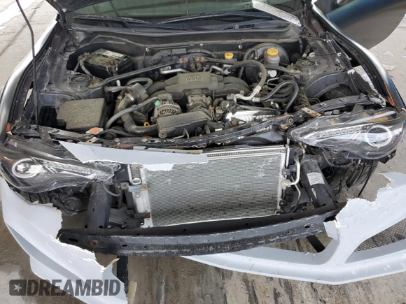 2014 Subaru BRZ Limited с VIN JF1ZCAC14E9601722, выставлен на аукционе Copart как лот 56002685 с пробегом 76 859 миль миль и Списание • Salvage title. История ставок и продаж доступна на DreamBid. Изображение 11.