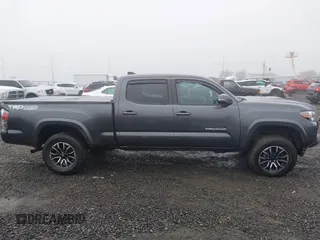 2021 Toyota Tacoma 4WD SR5 with VIN 3TMDZ5BN4MM099423, listed as a IAAI auction lot 41208397 with 62,935 mi miles. Bid and sale history available at carsss.com. Image 14.
