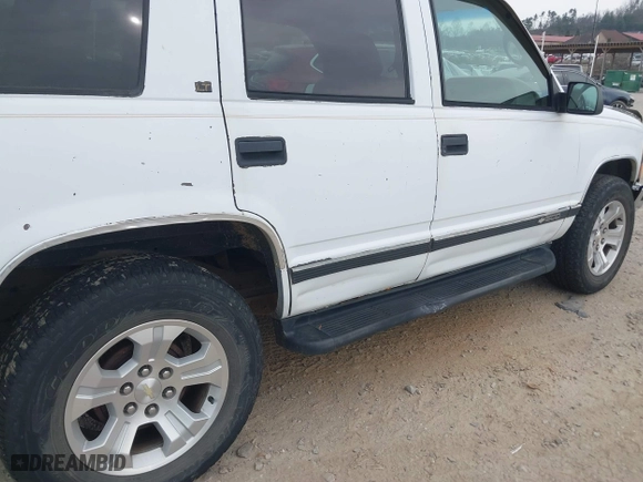1997 Chevrolet Tahoe with VIN 1GNEK13R4VJ361515, listed as a IAAI auction lot 41768386 with 216,974 mi miles. Bid and sale history available at carsss.com. Image 14.