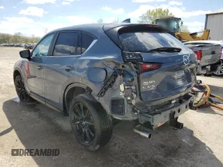 2024 Mazda CX-5 S Carbon Edition with VIN JM3KFBCL4R0460307, listed as a Copart auction lot 49671115 with 17,257 mi miles and Salvage Title. Bid and sale history available at DreamBid. Image 2.