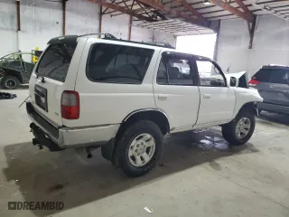 1998 Toyota 4Runner SR5 with VIN JT3HN86R3W0169984, listed as a Copart auction lot 85010594 with 184,178 mi miles and Salvage Title. Bid and sale history available at carsss.com. Image 3.