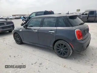 2016 MINI Hardtop 4 Door S with VIN WMWXU3C52G2D30894, listed as a Copart auction lot 50871865 with Not provided miles and Salvage title. Bid and sale history available at DreamBid. Image 2.