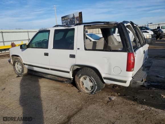 1999 Chevrolet Tahoe with VIN 1GNEC13RXXJ519095, listed as a Copart auction lot 43254645 with 176,861 mi miles and Salvage Title. Bid and sale history available at carsss.com. Image 2.