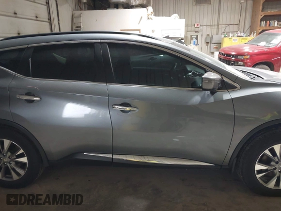 2016 Nissan Murano SL z VIN 5N1AZ2MH5GN125297, wystawiony jako IAAI lot #41973437 z przebiegiem 76 391 mil mil oraz . Historia ofert i sprzedaży dostępna na DreamBid. Obrazek 14.