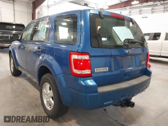 2011 Ford Escape XLS z VIN 1FMCU9C72BKB65226, wystawiony jako IAAI lot #42694360 z przebiegiem 169 375 mil mil oraz . Historia ofert i sprzedaży dostępna na DreamBid. Obrazek 3.