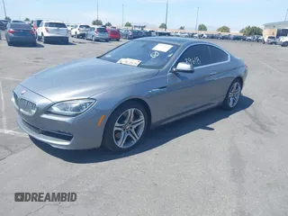 2013 BMW 6 Series 650i with VIN WBAYM9C53DDW20145, listed as a IAAI auction lot 42039618 with 66,684 mi miles and . Bid and sale history available at carsss.com. Image 2.