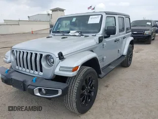 2023 Jeep Wrangler Sahara with VIN 1C4JJXP62PW627455, listed as a IAAI auction lot 42115137 with 62,143 mi miles and . Bid and sale history available at DreamBid. Image 17.