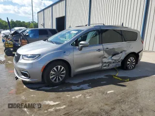 2021 Chrysler Pacifica Hybrid Touring L with VIN 2C4RC1L73MR594656, listed as a Copart auction lot 50737265 with 57,962 mi miles and Salvage title. Bid and sale history available at DreamBid. Image 1.