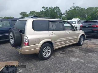 2006 Suzuki XL7 with VIN JS3TY92V764100229, listed as a IAAI auction lot 42423900 with Not provided miles and . Bid and sale history available at DreamBid. Image 4.