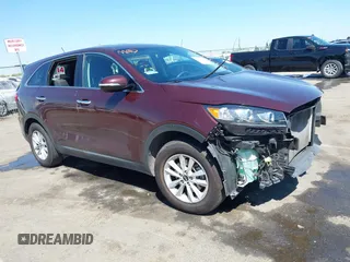 2019 Kia Sorento L z VIN 5XYPG4A3XKG520116, wystawiony jako IAAI lot #42193953 z przebiegiem 60 311 mil mil oraz . Historia ofert i sprzedaży dostępna na DreamBid. Obrazek 1.
