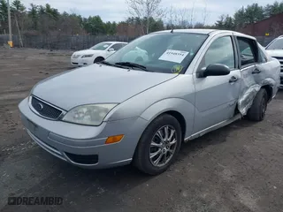 2005 Ford Focus S with VIN 1FAFP34N85W109720, listed as a IAAI auction lot 41948354 with 136,916 mi miles. Bid and sale history available at carsss.com. Image 17.