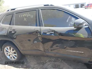 2016 Jeep Cherokee Limited z VIN 1C4PJMDS4GW124486, wystawiony jako IAAI lot #40503562 z przebiegiem 106 600 mil mil oraz . Historia ofert i sprzedaży dostępna na DreamBid. Obrazek 13.