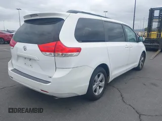 2012 Toyota Sienna LE AAS with VIN 5TDKK3DC4CS183817, listed as a IAAI auction lot 42013545 with 207,822 mi miles. Bid and sale history available at carsss.com. Image 4.