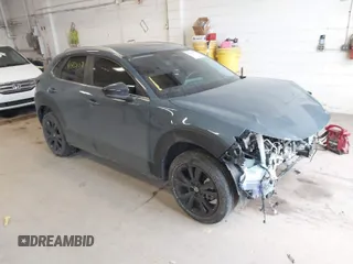 2024 Mazda CX-30 2.5 S Carbon Edition with VIN 3MVDMBCMXRM612697, listed as a IAAI auction lot 41428071 with 28,718 mi miles. Bid and sale history available at carsss.com. Image 1.