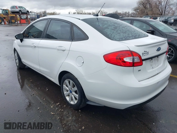 2012 Ford Fiesta SE with VIN 3FADP4BJ8CM102695, listed as a IAAI auction lot 41734833 with 131,779 mi miles. Bid and sale history available at carsss.com. Image 3.