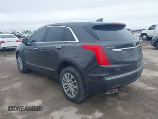 2017 Cadillac XT5 Luxury AWD z VIN 1GYKNDRS9HZ184992, wystawiony jako IAAI lot #41958484 z przebiegiem 124 941 mil mil oraz . Historia ofert i sprzedaży dostępna na DreamBid. Obrazek 3.