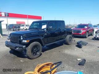 2023 Jeep Gladiator Freedom with VIN 1C6HJTAG1PL526229, listed as a IAAI auction lot 41972084 with 26,021 mi miles. Bid and sale history available at carsss.com. Image 18.