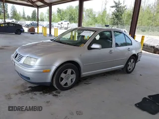2000 Volkswagen Jetta GLS z VIN 3VWSA29M4YM195775, wystawiony jako IAAI lot #42131518 z przebiegiem 314 472 mil mil oraz . Historia ofert i sprzedaży dostępna na DreamBid. Obrazek 18.
