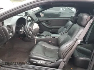 2002 Pontiac Firebird Formula z VIN 2G2FV22G822114416, wystawiony jako Copart lot #80131354 z przebiegiem 130 097 mil mil oraz Szkoda całkowita • Salvage title. Historia ofert i sprzedaży dostępna na DreamBid. Obrazek 7.