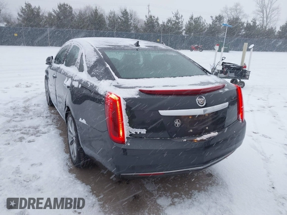 2013 Cadillac XTS with VIN 2G61N5S37D9112979, listed as a IAAI auction lot 41209826 with 83,237 mi miles. Bid and sale history available at carsss.com. Image 3.