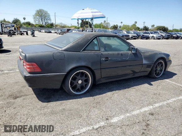 1992 Mercedes-Benz 500 z VIN WDBFA66E9NF050217, wystawiony jako Copart lot #58065965 z przebiegiem 143 456 mil mil oraz Tytuł czysty. Historia ofert i sprzedaży dostępna na DreamBid. Obrazek 3.