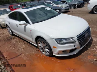 2014 Audi A7 Prestige with VIN WAU2GAFC1EN146328, listed as a IAAI auction lot 42209398 with 104,068 mi miles and . Bid and sale history available at DreamBid. Image 1.