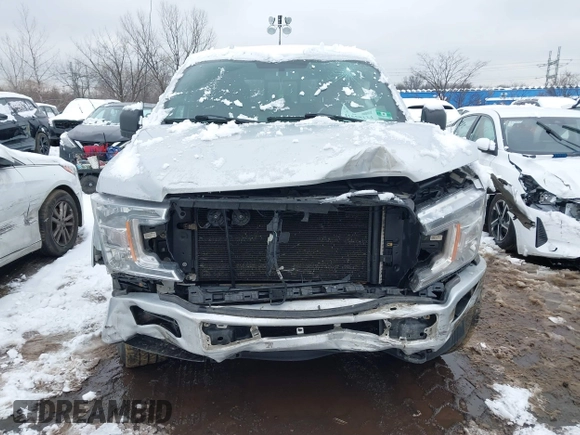 2018 Ford F-150 XL with VIN 1FTFW1E54JKC59793, listed as a IAAI auction lot 41558134 with 217,831 mi miles. Bid and sale history available at carsss.com. Image 12.