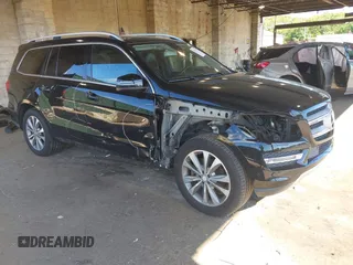 2014 Mercedes-Benz GL 450 z VIN 4JGDF7CE7EA395551, wystawiony jako IAAI lot #42247332 z przebiegiem 105 636 mil mil oraz . Historia ofert i sprzedaży dostępna na DreamBid. Obrazek 1.