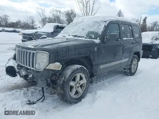 2009 Jeep Liberty Limited with VIN 1J8GN58K29W540097, listed as a IAAI auction lot 41593396 with 136,262 mi miles. Bid and sale history available at carsss.com. Image 2.
