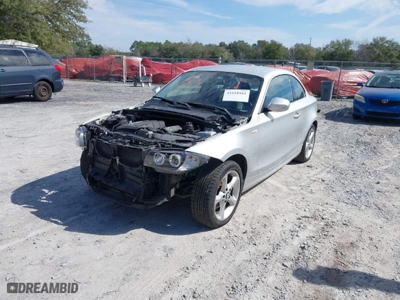 2011 BMW 1 Series 128i with VIN WBAUP7C59BVK78041, listed as a IAAI auction lot 41618161 with 1 mi miles. Bid and sale history available at carsss.com. Image 2.
