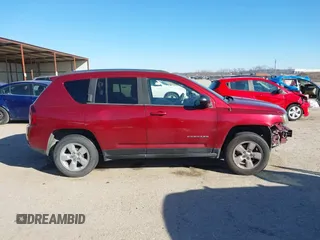 2014 Jeep Compass Sport with VIN 1C4NJCBA3ED812435, listed as a IAAI auction lot 41424374 with 174,663 mi miles and . Bid and sale history available at DreamBid. Image 14.