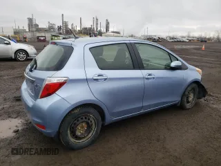 2012 Toyota Yaris L with VIN JTDKTUD33CD517298, listed as a Copart auction lot 52099335 with Not Provided miles and Salvage Title. Bid and sale history available at DreamBid. Image 3.