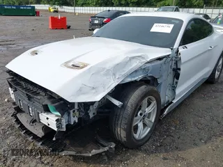 2020 Ford Mustang EcoBoost with VIN 1FA6P8TH9L5132788, listed as a IAAI auction lot 42246736 with 86,321 mi miles and . Bid and sale history available at DreamBid. Image 6.