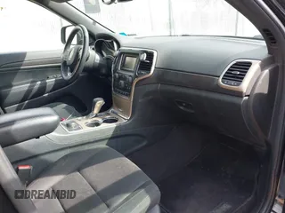 2017 Jeep Grand Cherokee Laredo with VIN 1C4RJFAGXHC863904, listed as a IAAI auction lot 41914465 with 122,981 mi miles. Bid and sale history available at carsss.com. Image 5.