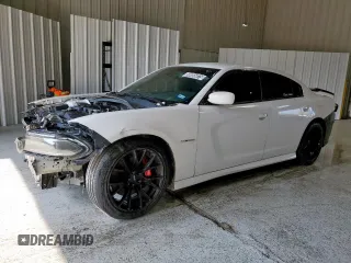 2021 Dodge Charger R/T z VIN 2C3CDXCT3MH601974, wystawiony jako Copart lot #58856875 z przebiegiem 54 036 mil mil oraz Czysty tytuł • Clean title. Historia ofert i sprzedaży dostępna na DreamBid. Obrazek 1.